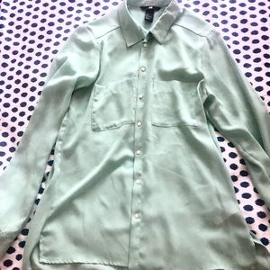 Mint colored long sleeve button-up blouse